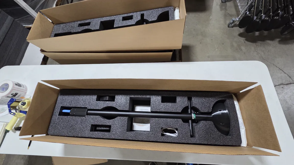 A TOMi instrument packed in its fitted foam carry case